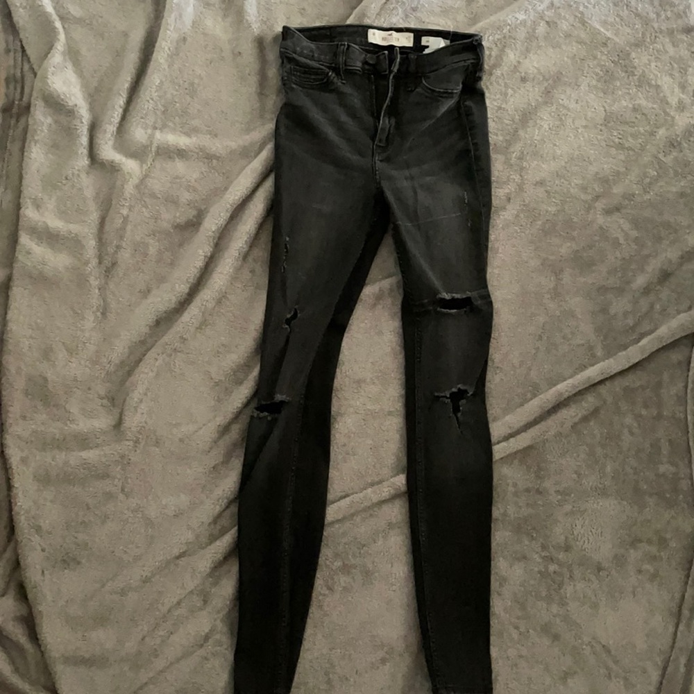 Black, slightly ripped jeans